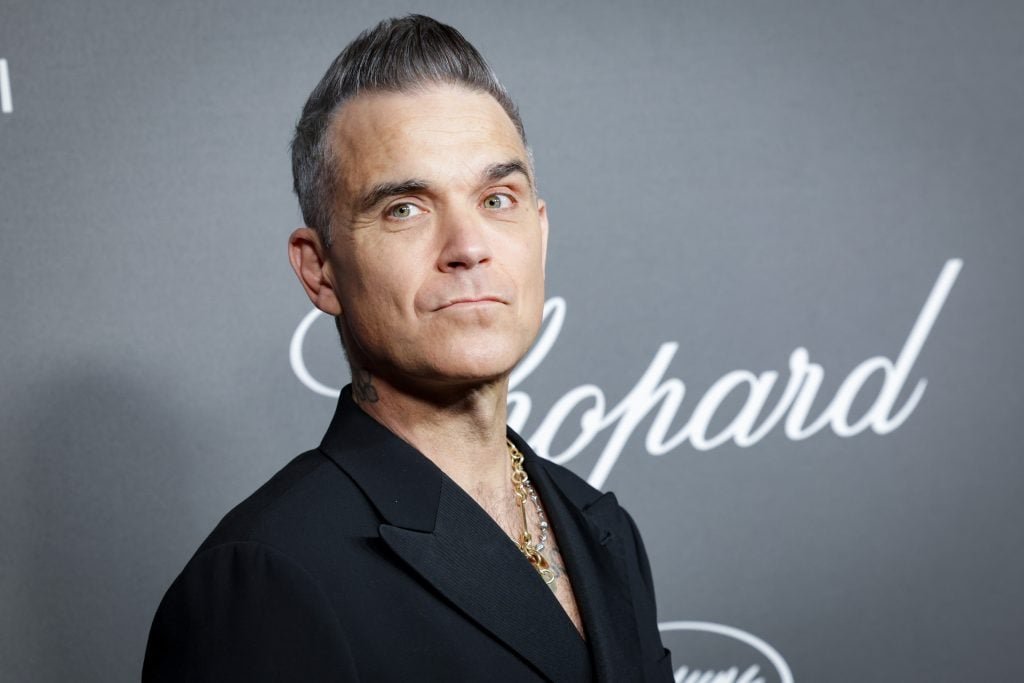 Robbie Williams attends the Chopard ART Evening at Martinez on May 23, 2023 in Cannes, France.