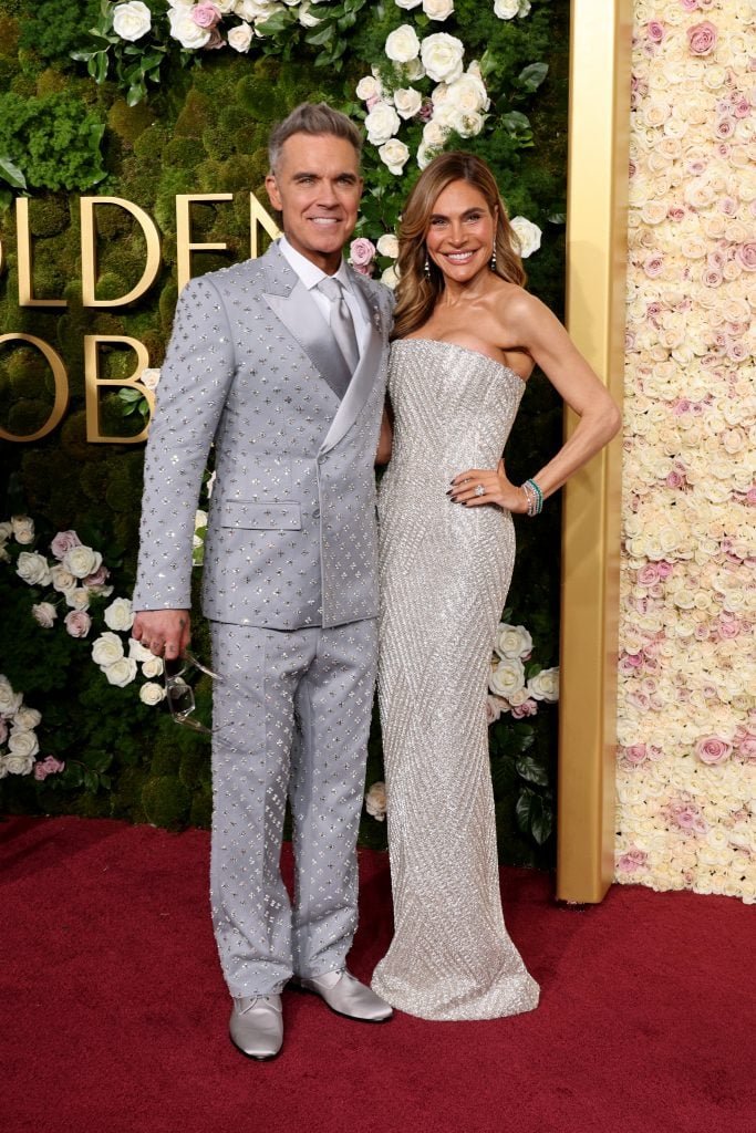 Robbie Williams and Ayda Field attend the 82nd Annual Golden Globe Awards at The Beverly Hilton on January 5, 2025 in Beverly Hills, California. 