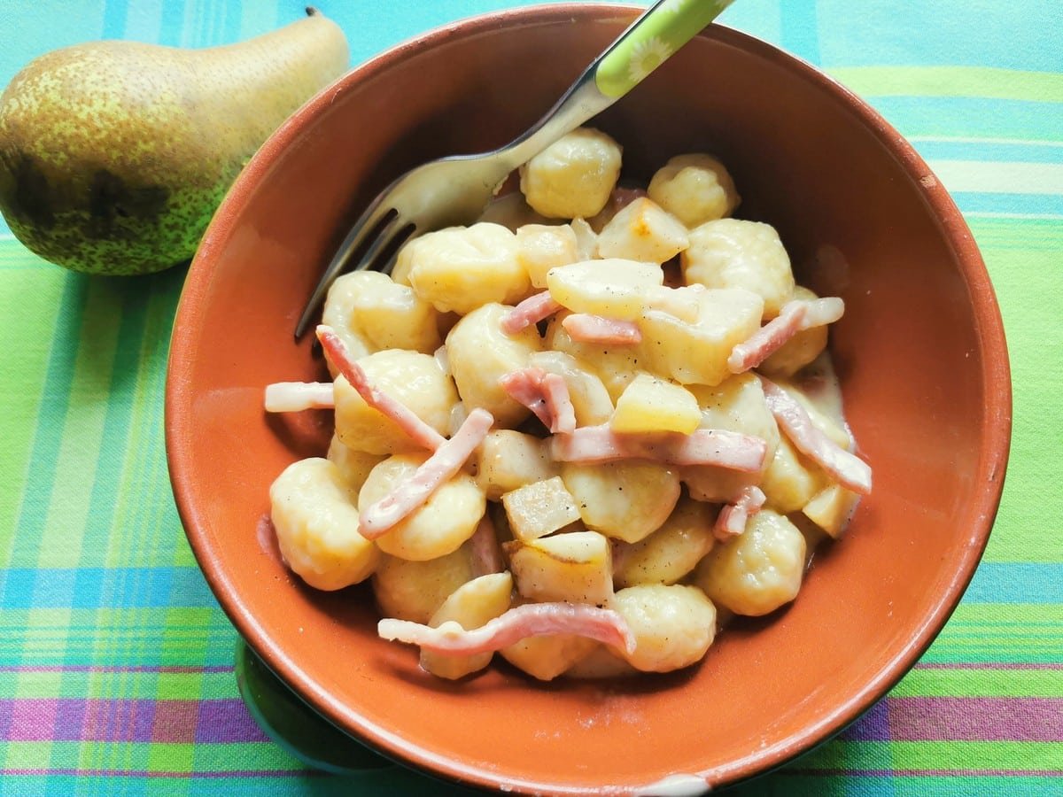 Gnocchi with taleggio from Lombardy in an earthenware bowl.