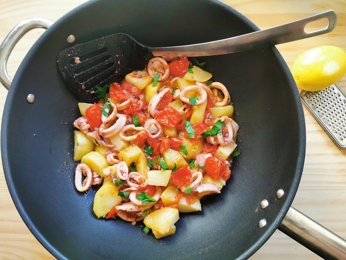 Calamari pasta sauce in a pot.