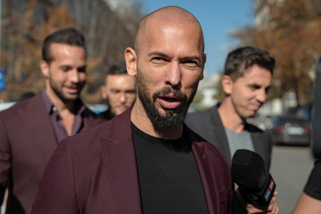 Andrew Tate speaks with the media outside the Court of Appeal on October 15, 2024 in Bucharest, Romania. Social Media -Influencer Andrew Tate and his brother Tristan appear in court to appeal a decision to continue with their trials of rape, human trafficking and form a criminal gang to exploit women. 