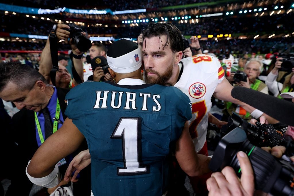 Jalen hurts #1 by Philadelphia Eagles and Travis Kelce #87 from Kansas City Chiefs meet after Philadelphia beat Kansas City 40-22 to win the Super Bowl Lix at Caesar's Superdome on February 9, 2025 in New Orleans, Louisiana.