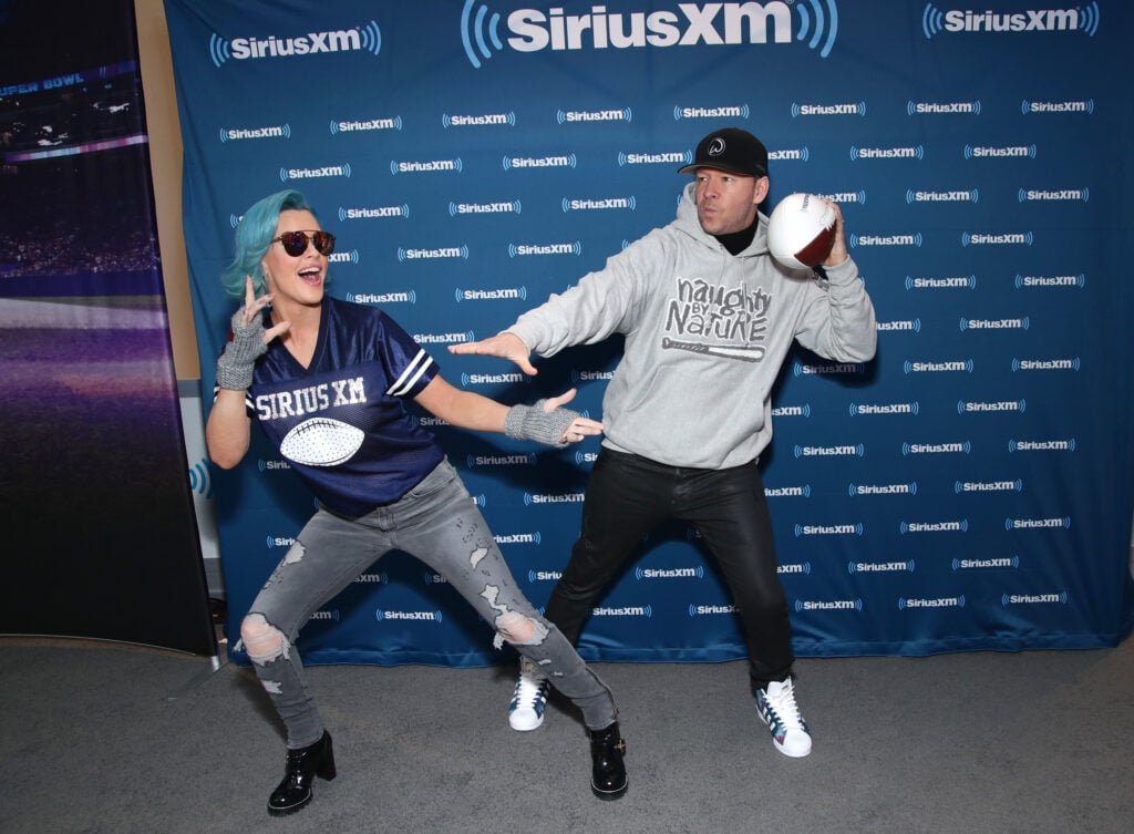 Jenny McCarthy and Donnie Wahlberg visit Siriusxm on the Super Bowl Lii Radio Row in Mall of America on February 2nd 2018 in Bloomington, Minnesota.