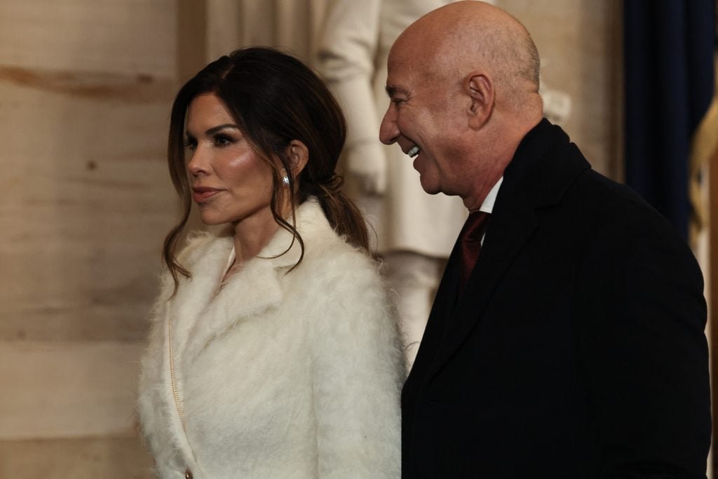 Founder of Amazon and Blue Origin Jeff Bezos and his fiancé Lauren Sanchez resigns inauguration ceremonies in the Rotunda in the US capital on January 20, 2025 in Washington, DC. 